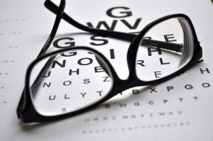 Eye Glasses on Eye Exam Chart